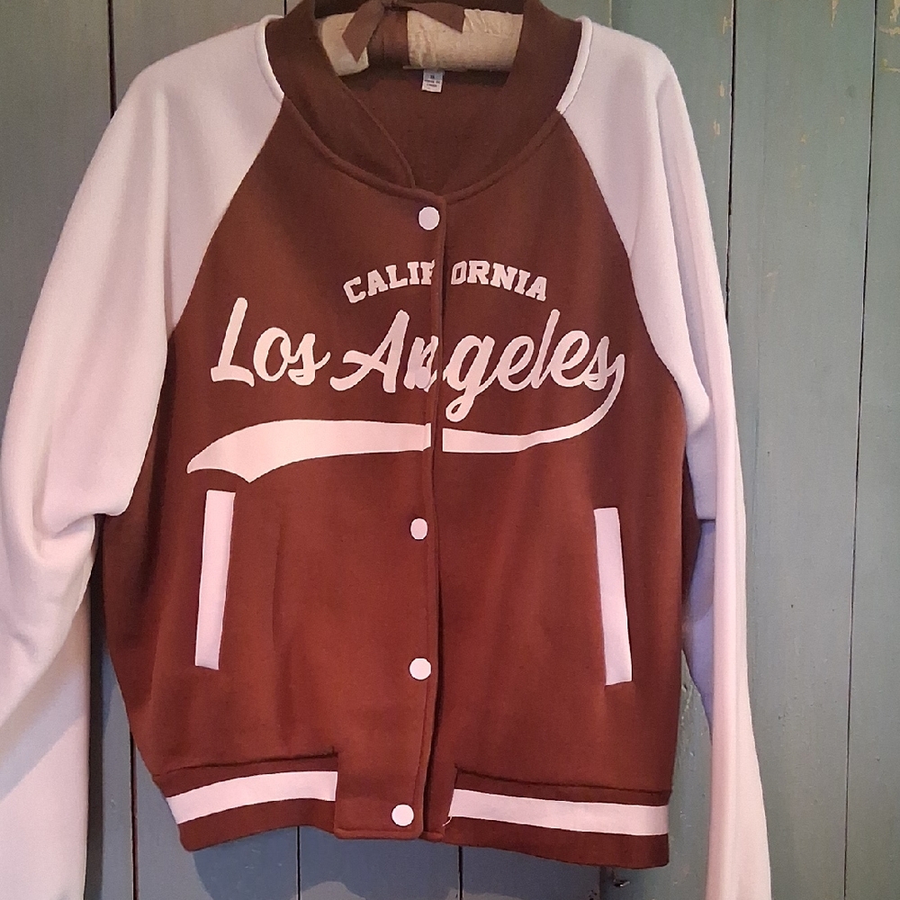 Brown and White Varsity Jacket. Functioning Front Pockets.